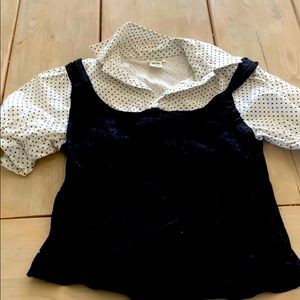 Black corset like top.